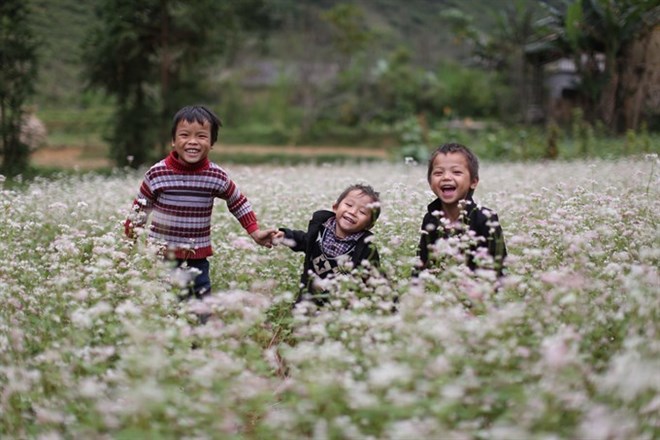 Happy smile of Ethnic peolpe in Buckwheat flower field